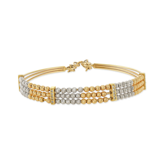 18ct yellow gold bracelet/bangle with yellow and white ball design 01002544